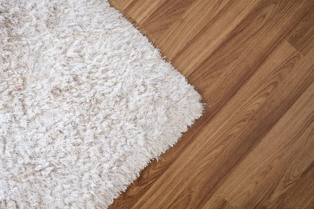 Carpet vs Hardwood Flooring: Durability and maintenance 